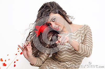 Attractive curly hair girl with glowing cupid wand Stock Photo