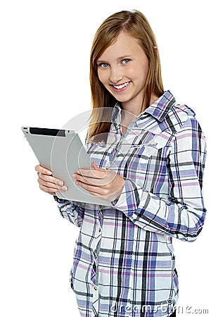 Attractive cute girl holding a tablet device Stock Photo