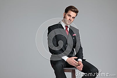 Attractive fashion model wearing double breasted suit Stock Photo