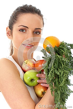 Attractive female holds bunch of fruit and veg Stock Photo