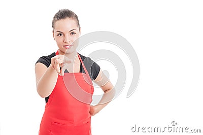 Attractive female supermarket seller supervising you Stock Photo