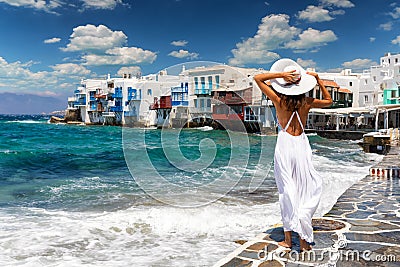 Attractive female tourist in famous Little Venice on Mykonos island, Greece Stock Photo