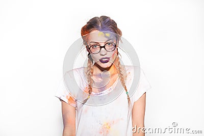 Attractive girl with Holi colors on face Stock Photo