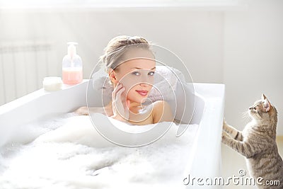 Attractive girl relaxing in bath Stock Photo