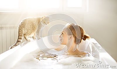 An Attractive girl relaxing in bath Stock Photo