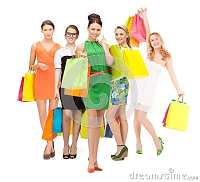Attractive girls holding color shopping bags Stock Photo