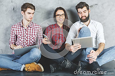 Attractive group using devices Stock Photo