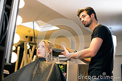 Attractive hair dresser Stock Photo