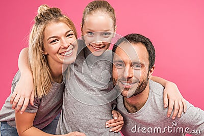 attractive happy daughter embracing her parents, isolated Stock Photo