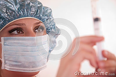 Attractive hispanic adult medical personnel Stock Photo