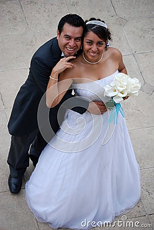 Attractive Hispanic Bride and Groom Stock Photo