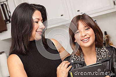 Attractive Hispanic Proud Mom & Pretty Daughter Stock Photo