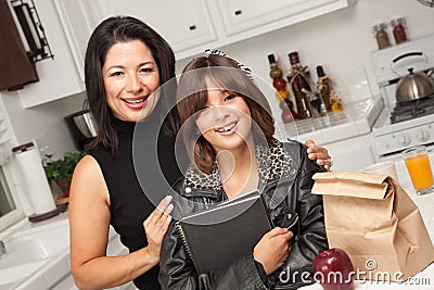 Attractive Hispanic Proud Mom & Pretty Daughter Stock Photo