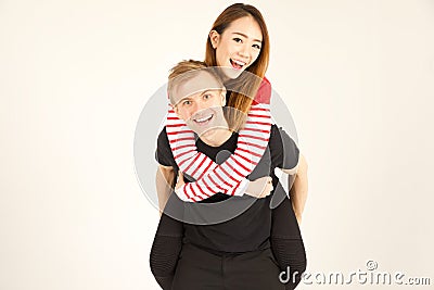 Attractive inter racial couple being close together Stock Photo