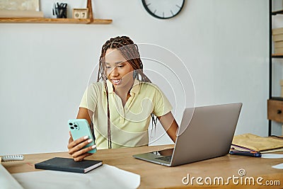 attractive jolly african american female seller Stock Photo