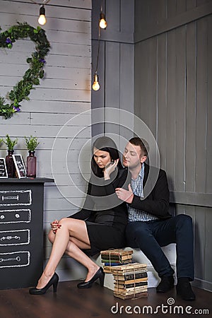 Attractive loving couple in a stylish interior. Stock Photo