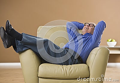 Attractive male senior laughing. Stock Photo