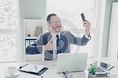 Attractive man in formal wear take selfie picture demonstration Stock Photo