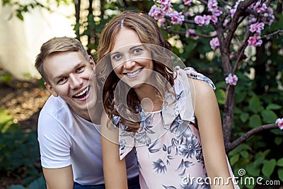 Attractive positive couple toothy smiling at camera Stock Photo
