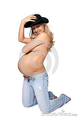 Attractive pregnant woman in a black hat Stock Photo