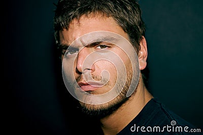 Attractive Serious Young Man Stock Photo