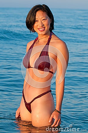 https://thumbs.dreamstime.com/x/attractive-smiling-asian-woman-bikini-12595899.jpg