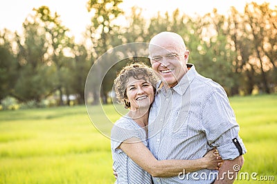 Attractive Smiling Mature couple portrait outdoors Stock Photo