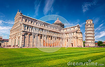 Attractive summer view of famous Leaning Tower in Pisa. Sunny morning scene with hundreds of tourists in Piazza dei Miracoli Stock Photo