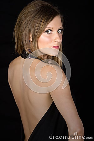 Attractive Teen Looking over her Shoulder Stock Photo