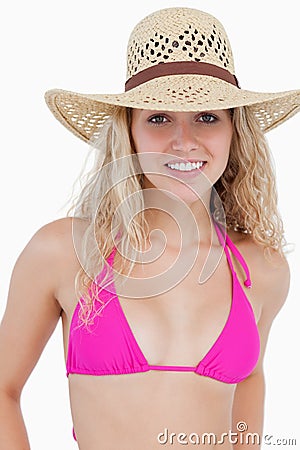 Attractive teenager in beachwear standing upright Stock Photo