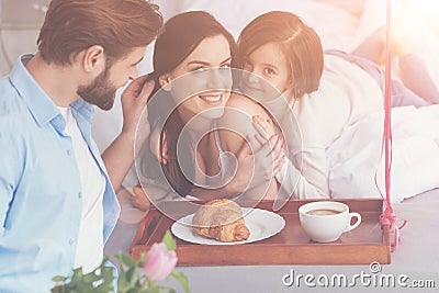 Attractive thankful woman happy having a family like this Stock Photo