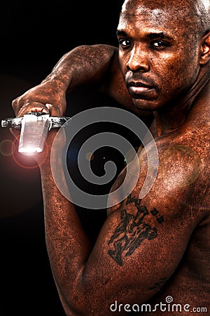 Attractive Thirties Black Man with Sword Stock Photo