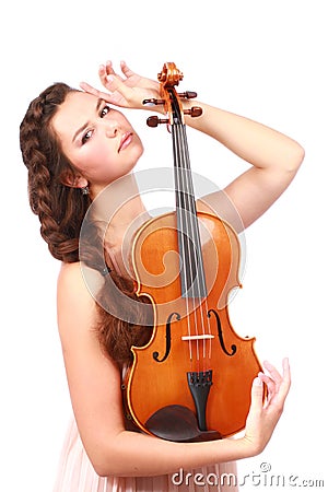 Attractive violinist posing with violin Stock Photo