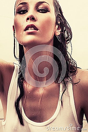 Attractive wet brunette girl in shower Stock Photo