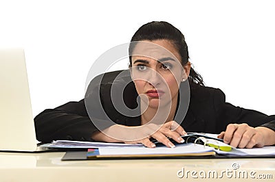 Attractive woman in business suit working tired and bored in office computer desk looking sad Stock Photo