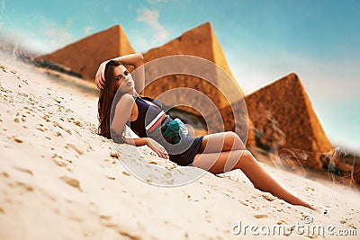 Attractive woman in egypt on pyramid background Stock Photo