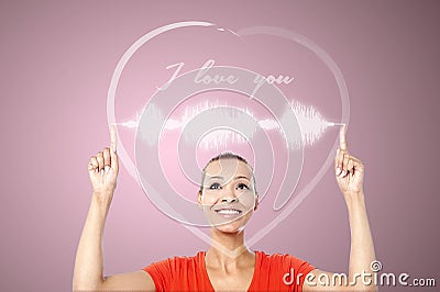 Attractive woman with heart graphics Stock Photo