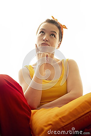 Attractive woman hesitating on white Stock Photo
