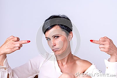 Attractive woman making a middle finger gesture Stock Photo