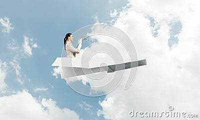 Attractive woman playing trumpet brass Stock Photo