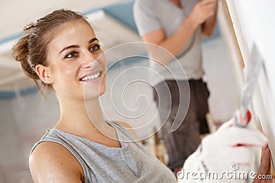 Attractive woman renewing house Stock Photo