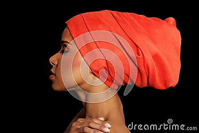 Attractive woman's profile in turban. Closed eyes. Stock Photo