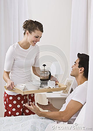https://thumbs.dreamstime.com/x/attractive-woman-serving-breakfast-bed-9913839.jpg