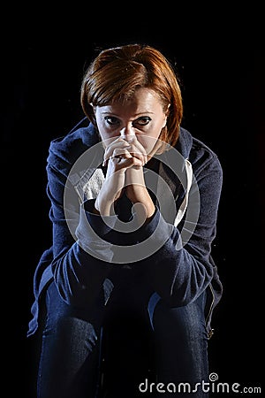 Attractive woman suffering depression and stress alone in pain and grief Stock Photo