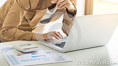 Attractive women in casual business sitting at a table working o Stock Photo