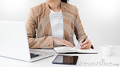 Attractive women in casual business sitting at a table working o Stock Photo