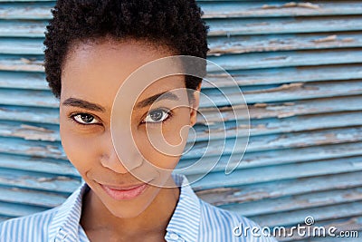 Attractive young black woman smirking Stock Photo