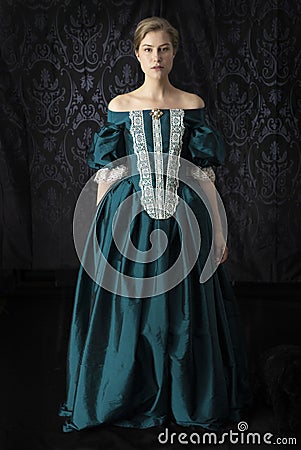 Victorian, 18th century, or renaissance woman in a silk dress Stock Photo