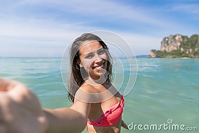 Attractive Young Caucasian Woman In Swimsuit On Beach Taking Selfie Photo, Girl Blue Sea Water Holiday Stock Photo