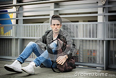 Attractive young man inside station Stock Photo